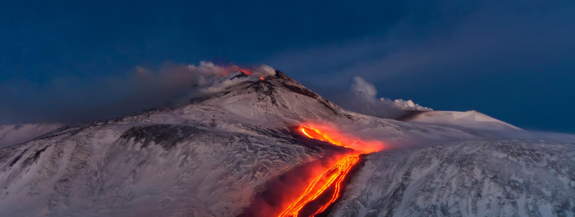 The erupting Etna volcano. Etna tour with guide